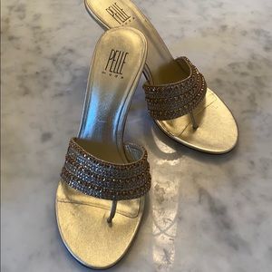 Ladies heeled sandal.  jewlels across foot